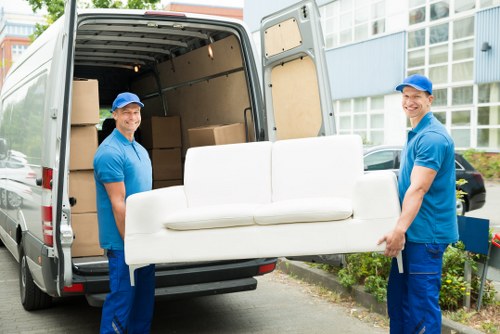 House removal team helping move belongings in Islington