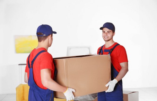 Removal van and moving boxes for a house move in Islington