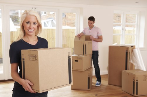 Removalists loading furniture for a home move in Islington