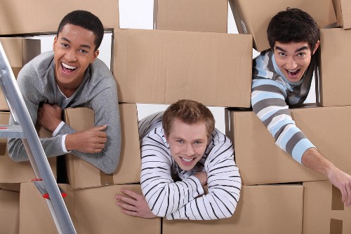 Careful loading of office furniture during an Islington collection