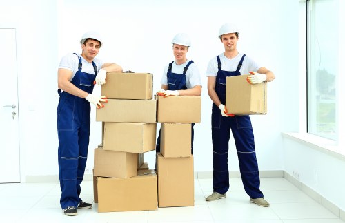 Removal team handling furniture in a flat move near Angel in Islington