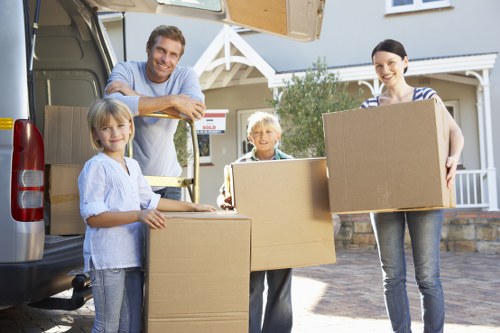 Packed boxes and furniture prepared for transport in Islington