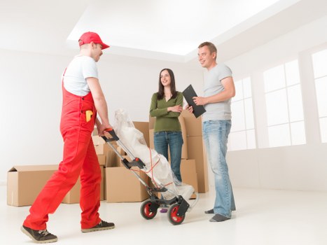 Packed boxes and household items ready for a local move in Islington