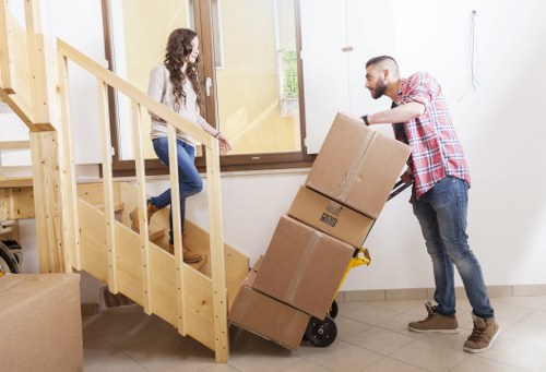 Furniture being carefully moved in an Islington property